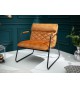 Fauteuil de salon design en velours jaune moutarde
