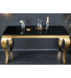 Table console baroque noire et métal doré