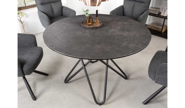 Table ronde en céramique béton nuancé