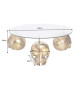 Table basse ronde originale avec crânes dorés